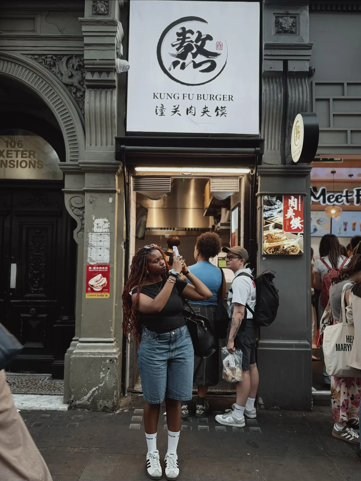 Seyi outside Kung Fu Burger